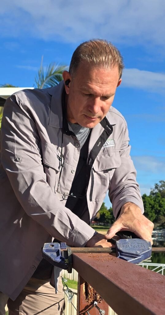 SURVE handyman working on an outdoor repair job