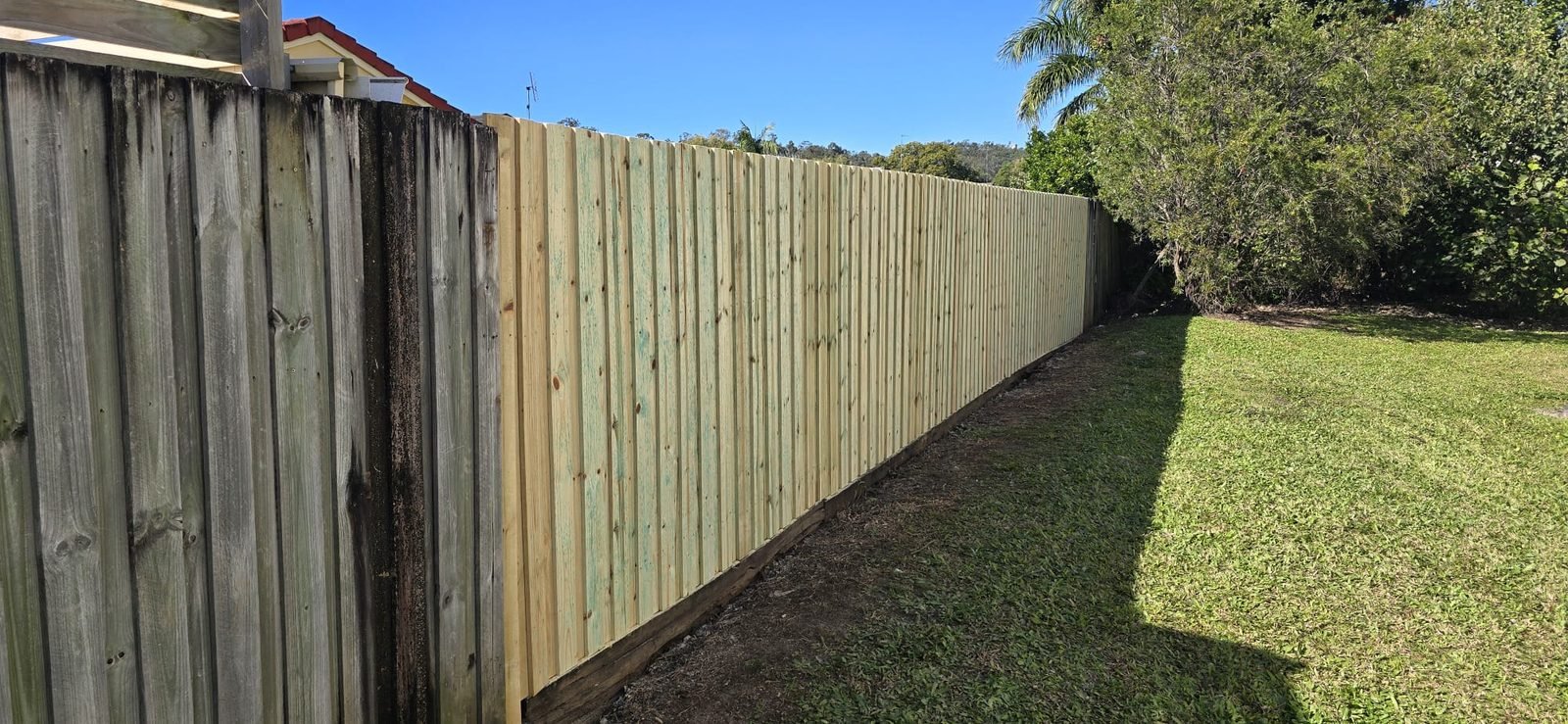After: timber paling fence by SURVE, Gold Coast
