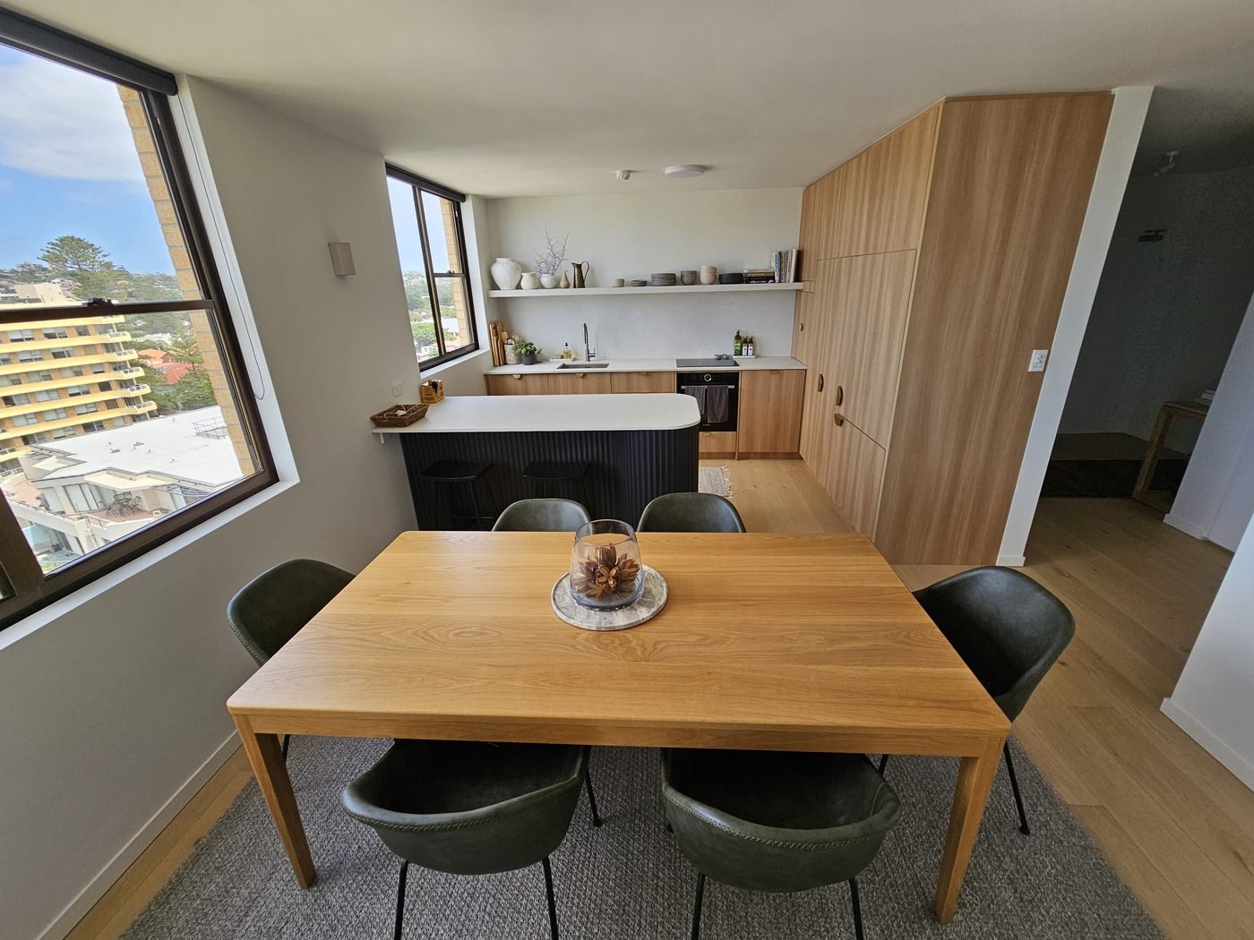After: open-plan kitchen and dining renovation by SURVE